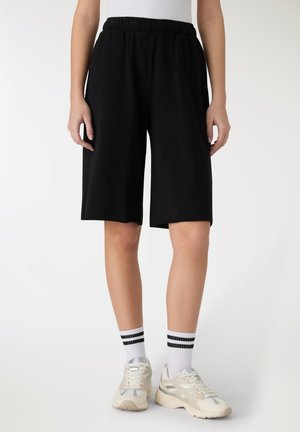 - Spodnie treningowe