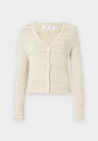 Knit cardigan in beige with a V-neck, long sleeves, and five-button closure. Features a textured pattern and cropped design.