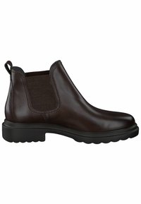 Botas Chelsea de cuero marrón con paneles laterales elásticos, acentos de tela texturizada y una suela de goma con un patrón de olas. Lengüeta en el talón.