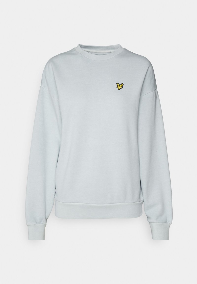 Felpa azzurra chiaro con scollatura rotonda e maniche lunghe. Presenta un piccolo logo di un uccellino giallo sul petto e polsini a costine.