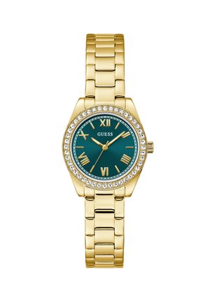 Sat za ruku od metala zlatne boje s tirkiznim brojčanikom, rimskim brojkama, okvirom ukrašenim kristalima, tri kazaljke i narukvicom s povezima.