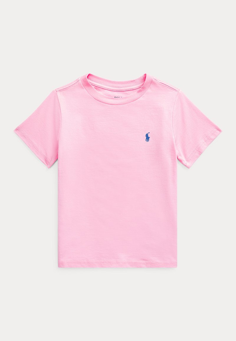 T-shirt en coton rose clair à manches courtes avec un col rond et un petit logo joueur de polo bleu foncé sur la poitrine gauche.