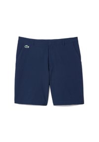 Pantalones cortos azul marino confeccionados en una tela suave con frente plano, bolsillos laterales y un pequeño logo verde de Lacoste en la parte delantera izquierda.