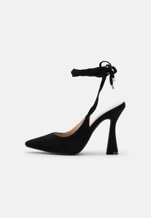 Hoge hakken - black