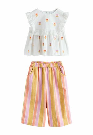White top with floral embroidery and ruffled sleeves, paired with yellow, pink, and orange vertical striped shorts with pockets.