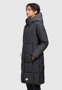 Black puffer coat featuring a hood, diagonal stitching, side pockets with zippers, and a logo patch at the hem. Smooth texture and warm design.