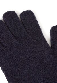 Tmavě fialové vlněné rukavice s měkkým, texturovaným povrchem a rovnými prsty. Tkanina vypadá teple a silně, ideální pro chladné počasí.