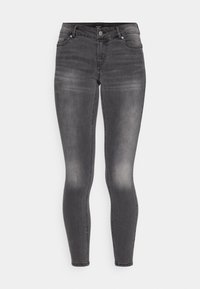 Gray skinny jeans made of denim with a faded finish, featuring a front zipper and button closure, five pockets, and a fitted silhouette.
