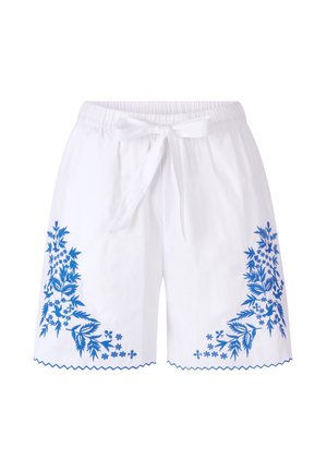 White linen shorts with a fitted waist and bow tie. Features blue floral embroidery and scalloped hem accents.