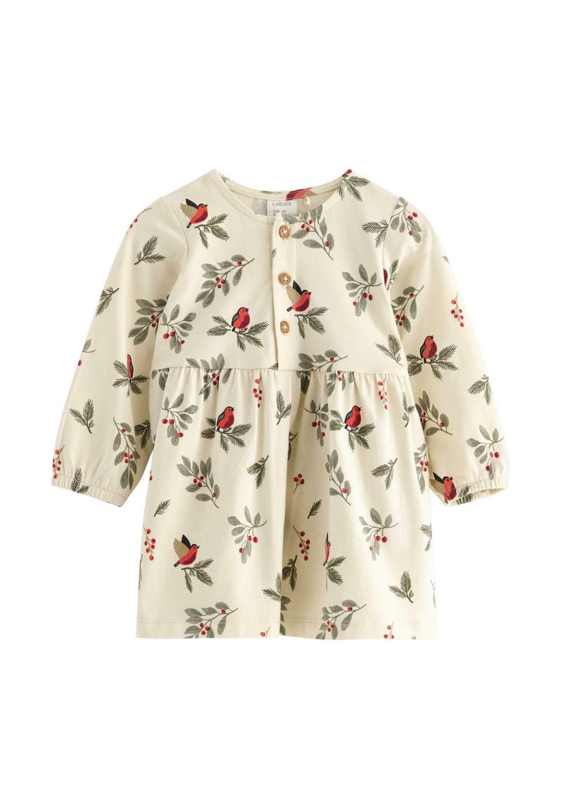 Langärmliges, cremefarbenes Kleid mit gerafftem Taillenbereich, das ein Muster aus Vögeln und Blättern aufweist, Holzknöpfen und elastischen Bündchen.