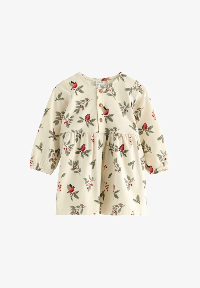 Langzaam, romig gekleurd jurkje met een gathered taille, met een patroon van vogels en bladeren, houten knopen en elastische manchetten.