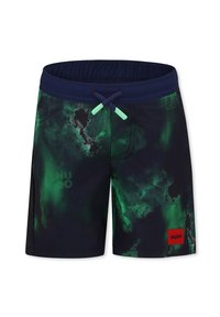 Costumi da bagno di colore blu scuro con motivi astratti verdi. Presentano una vita elastica, lacci regolabili e una patch con logo rosso.