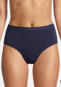 Marineblaue hochgeschnittene Unterhosen aus dehnbarem Material, mit einem glatten Bund und nahtlosen Kanten für einen bequemen Sitz.