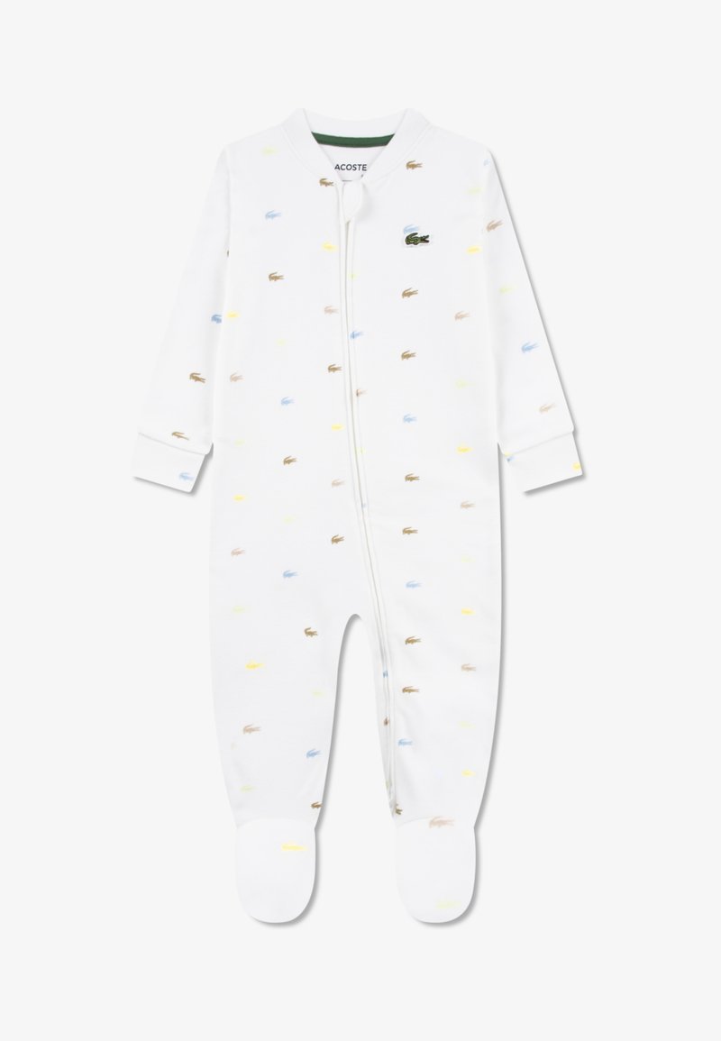 Λευκό βαμβακερό φορμάκι με πολύχρωμα σχέδια κροκοδείλων σε μπλε, κίτρινο και καφέ. Διαθέτει φερμουάρ εμπρός και καλυμμένα πόδια.