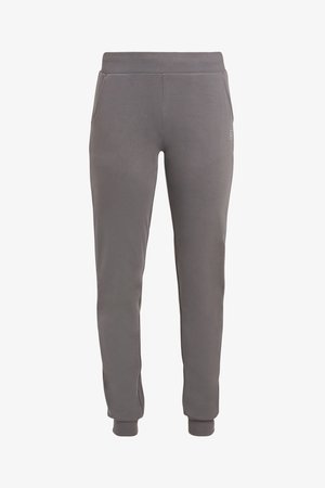 Graue Jogginghose aus weichem Stoff, mit einem elastischen Bund, Seitentaschen und gerippten Bündchen an den Knöcheln.