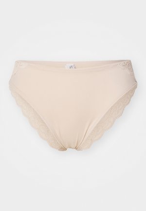 Beige Unterwäsche aus glattem Stoff mit gewelltem Spitzenbesatz am Bund, die ein weiches, nahtloses Design und einen subtilen Glanz aufweist.