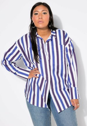 Long-sleeve button-up shirt featuring vertical stripes in shades of blue and purple, made from smooth fabric with a relaxed fit and two chest pockets.
