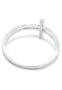 Silver ring featuring a smooth band with a textured accent. A vertical bar intersects the band, adding a distinctive detail.