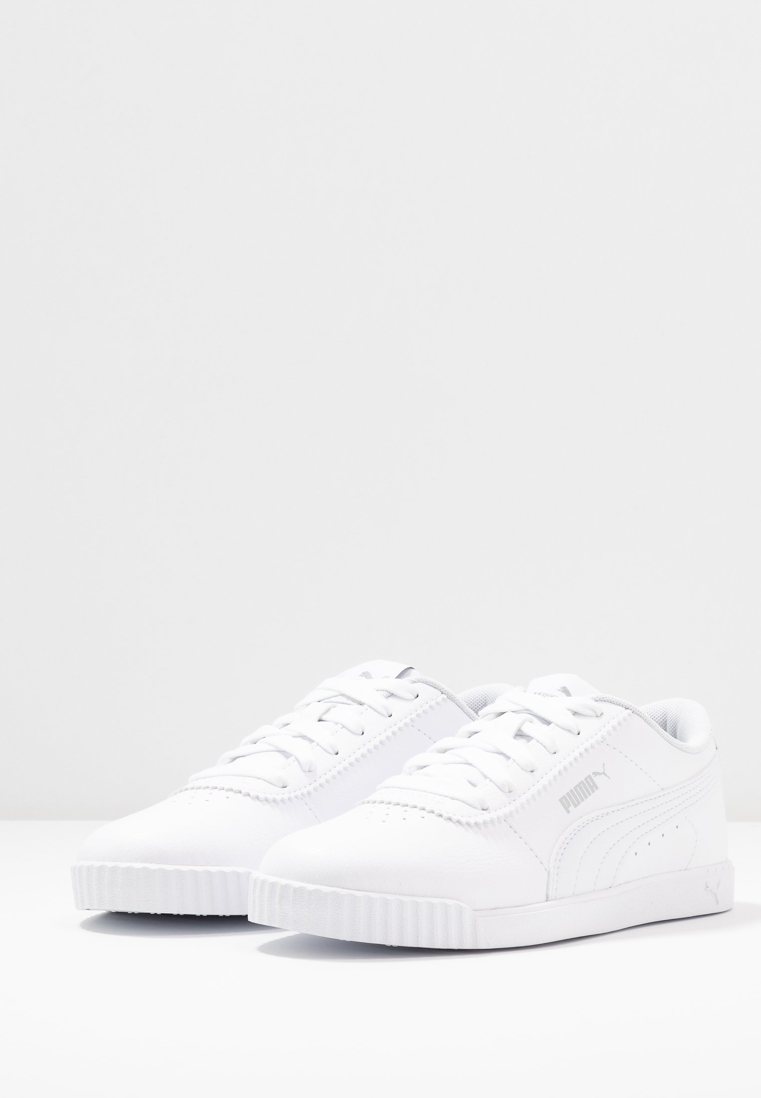 slim white trainers