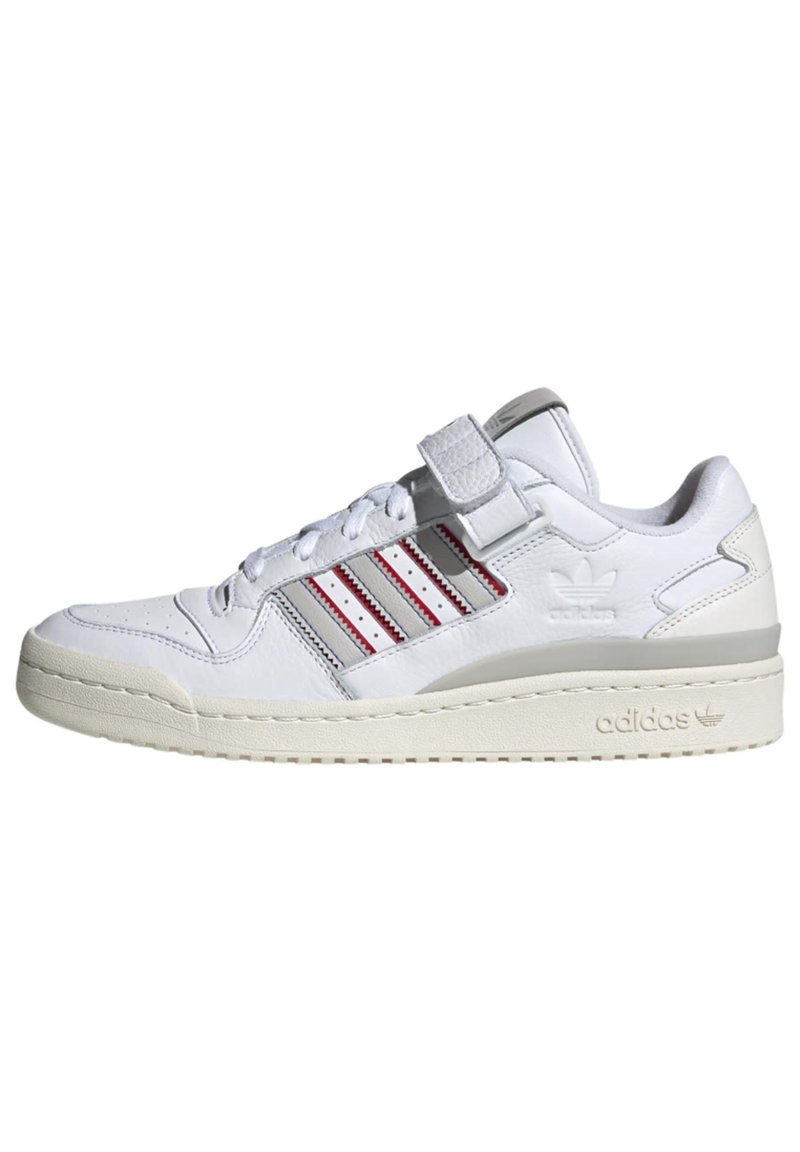 White leather sneaker with gray accents, three red stripes, lace and Velcro closure, textured toe cap, and a thick cream rubber sole.