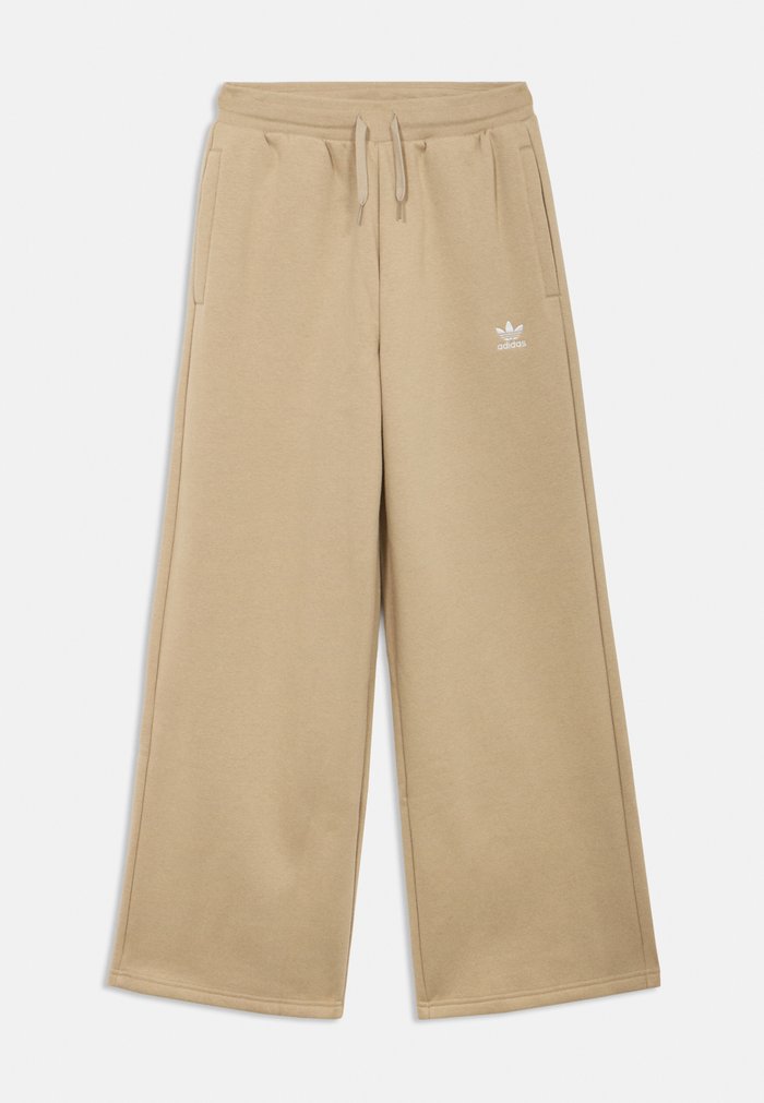 adidas WIDE LEG PANTS JUNIOR UNISEX - Tracksuit bottoms - stone khaki