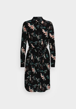 Zwart jurk met lange mouwen met een roze en groen bloemenpatroon, knoopsluiting aan de voorkant, kraag en taillekoord.