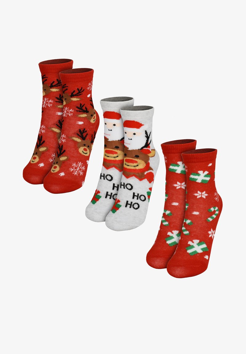 Four pairs of festive socks: red with reindeer and snowflakes, gray with Santa and a reindeer, red with candy canes and presents.