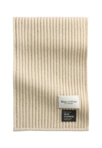 Écharpe en cachemire beige avec texture côtelée verticale, comprenant une étiquette blanche et une étiquette noire avec instructions d'entretien et détails de la marque.
