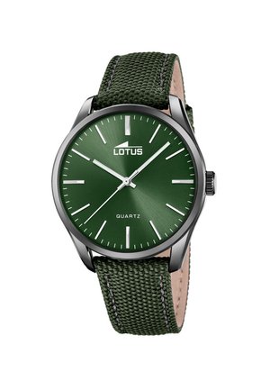 Zegarek naręczny Lotus kwarcowy z zieloną tarczą o efektze rozchodzącego się światła, srebrnymi znacznikami godzin i wskazówkami oraz teksturowanym zielonym paskiem z tkaniny.