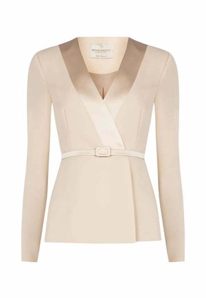 Blusa beige a maniche lunghe con scollo a V, rifinitura in raso e cintura abbinata in vita.