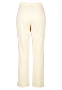 Crème-kleurige sweatpants met een elastische tailleband, twee achterzakken en een recht model. Gladde textuur met eenvoudige elkaar.