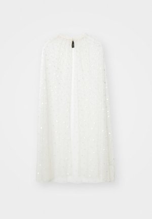 Cape blanc transparent avec un col froncé, ornée de paillettes en argent dispersées, présentant une ouverture centrale de haut en bas.