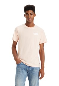 Levi's® GRAPHIC CREWNECK TEE - Camiseta estampada - pale peach