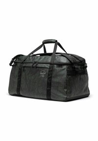 Sac de sport vert foncé et noir avec un motif de branches d'arbre, deux poignées supérieures, une bandoulière, une poche zippée à l'avant et un patch logo Herschel.