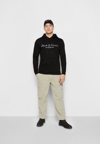 Jack & Jones JCOBERGSWEAT HOOD NOOS - Džemperis ar kapuci - black