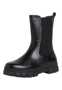 Black ankle boots made of glossy leather with elastic side panels, a rugged rubber sole, and structured toe design.