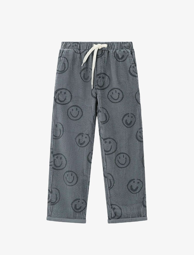 Pantalon en velours côtelé gris à coupe décontractée, avec une taille élastique et un cordon blanc, décoré de motifs de visages souriants noirs.