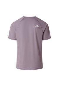 Light purple short-sleeve athletic shirt with a textured fabric, featuring a round neck, raglan sleeves, and a reflective logo on the upper back.