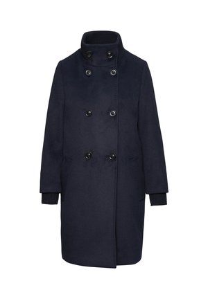 Cappotto in misto lana di color navy con colletto alto, chiusura doppiopetto, bottoni neri e polsini a costine. Silhouette dritta classica.