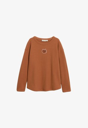 Ruskea ribbineulottu pitkähihaisen neulepaita, jossa on pyöreä kaula-aukko ja rinnan kohdalla kirjailtu kissan kasvot. Pehmeä pinta ja rento istuvuus.