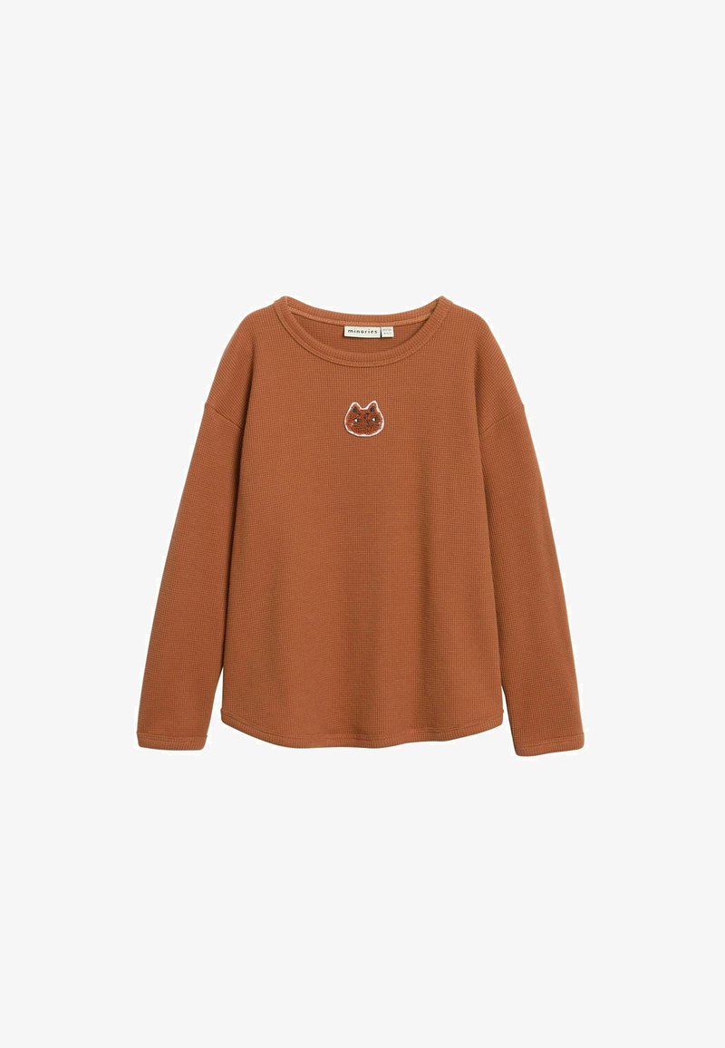 Bruine geribbelde trui met lange mouwen, een ronde halslijn en een kattengezicht geborduurd op de borst. Zachte textuur en een losse pasvorm.
