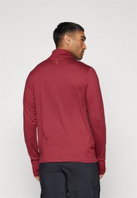 Under Armour LAUNCH PRO 1/4 ZIP - Long sleeved top - cardinal