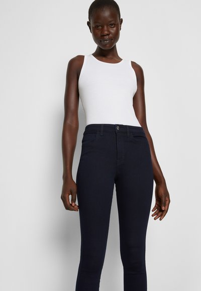 Filippa K LOLA SUPER STRETCH - Calças de ganga de corte skinny - mid dark denim