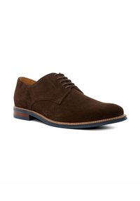 Brown suede dress shoe with a rounded toe, lace-up design, and a contrasting blue rubber sole. Includes visible stitching detail.
