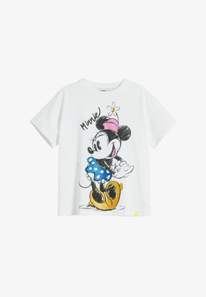 Camiseta blanca de algodón con una ilustración en negro y rosa de Minnie Mouse vestida con un vestido azul con lunares y zapatos amarillos, con un acento de margarita.
