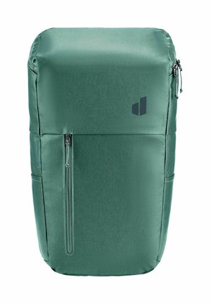 Sac à dos rectangulaire vert avec une poche avant zippée verticale et un petit logo noir sur une surface en tissu lisse.