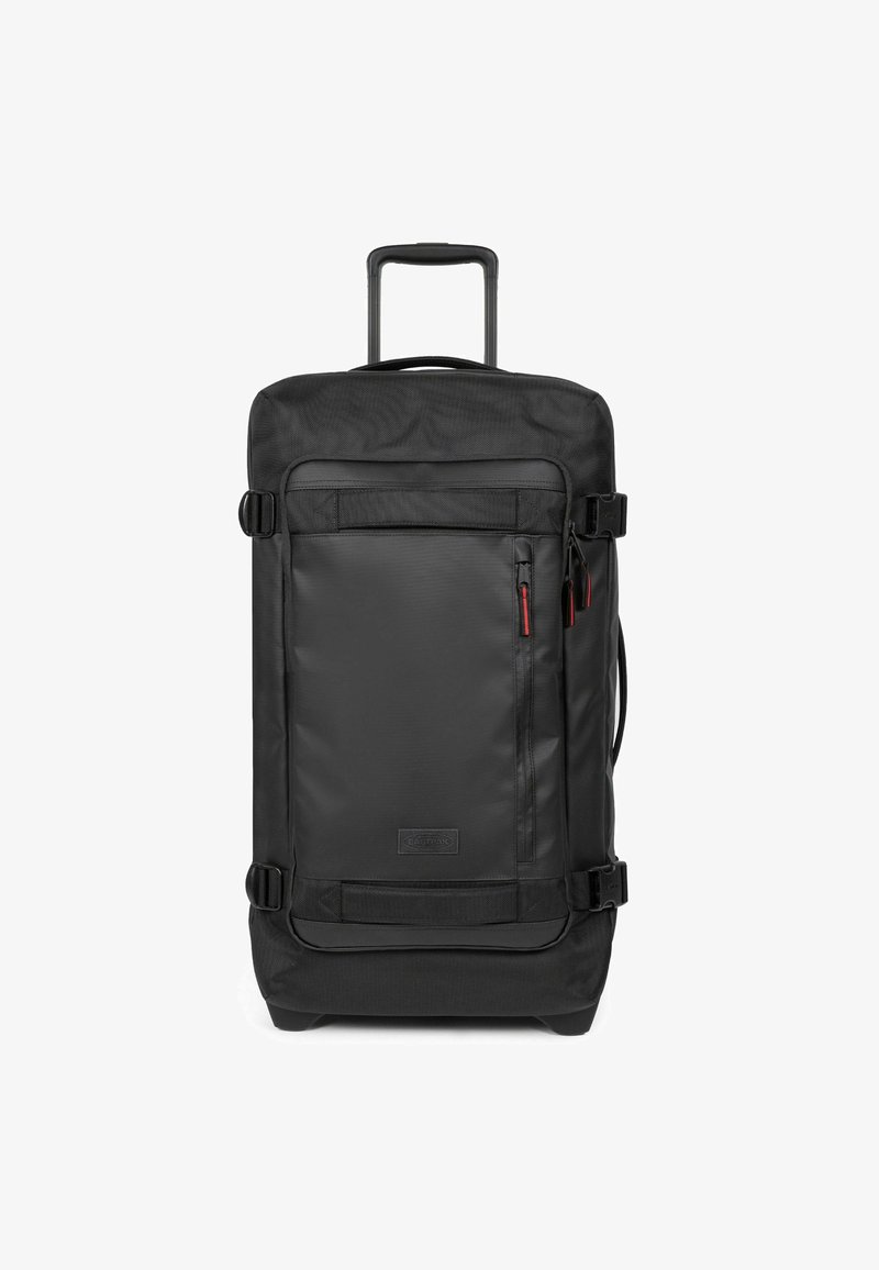 Černý rolovací batoh vyrobený z odolného nylonu, s velkým hlavním oddílem, přední kapsou na zip a pevným držadlem pro snadné přenášení.