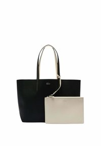 Borsa tote nera con manici crema, caratterizzata da un logo Lacoste. Include un pouch con cerniera di un grigio chiaro staccabile con logo abbinato.