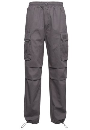 Gray cargo pants with an elastic waistband, multiple side pockets, and adjustable cuffs. Made of durable fabric with a smooth texture.