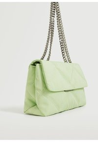 Quilted green handbag with a smooth texture, silver chain strap, and a flap closure. Features geometric stitching across the surface.